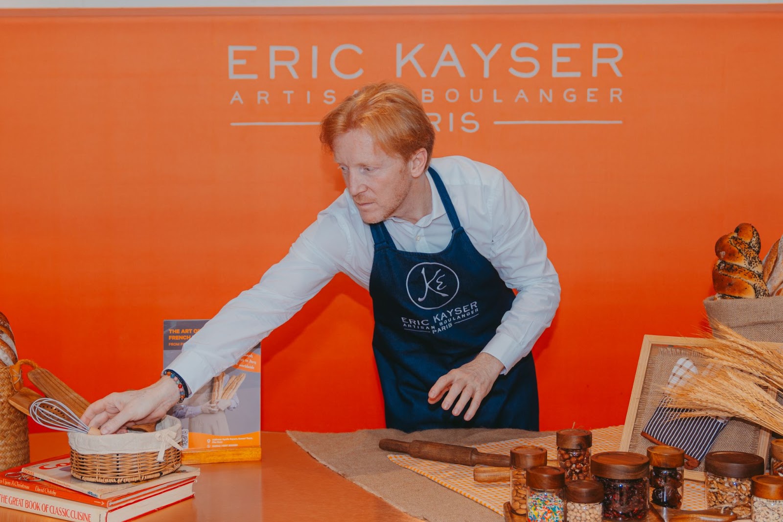 Master baker Eric Kayser proudly celebrates the opening of his bakery in Sunset Town