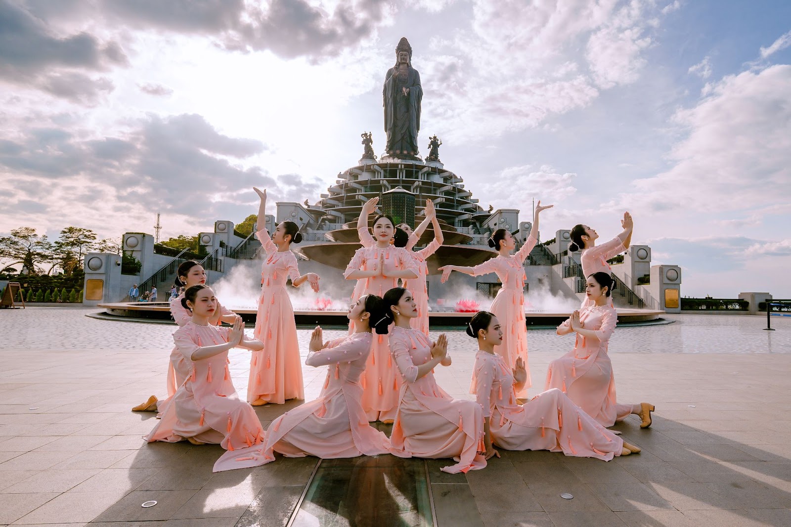 Ceremonial art performance before the Lady Buddha statue at Ba Den Mountain, reflecting harmony and spirituality.