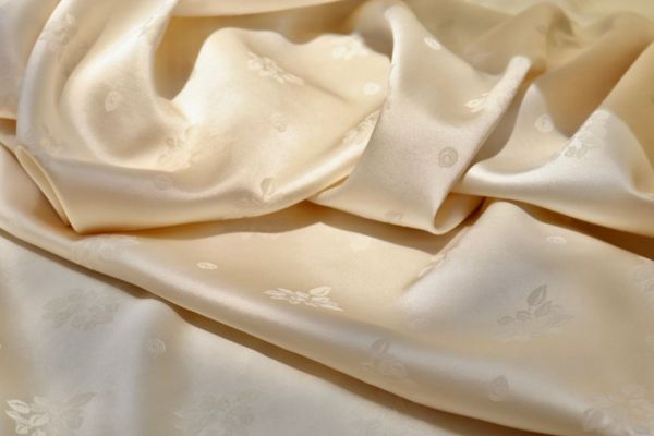 Quality silk usually has a sheen and is smooth to the touch.