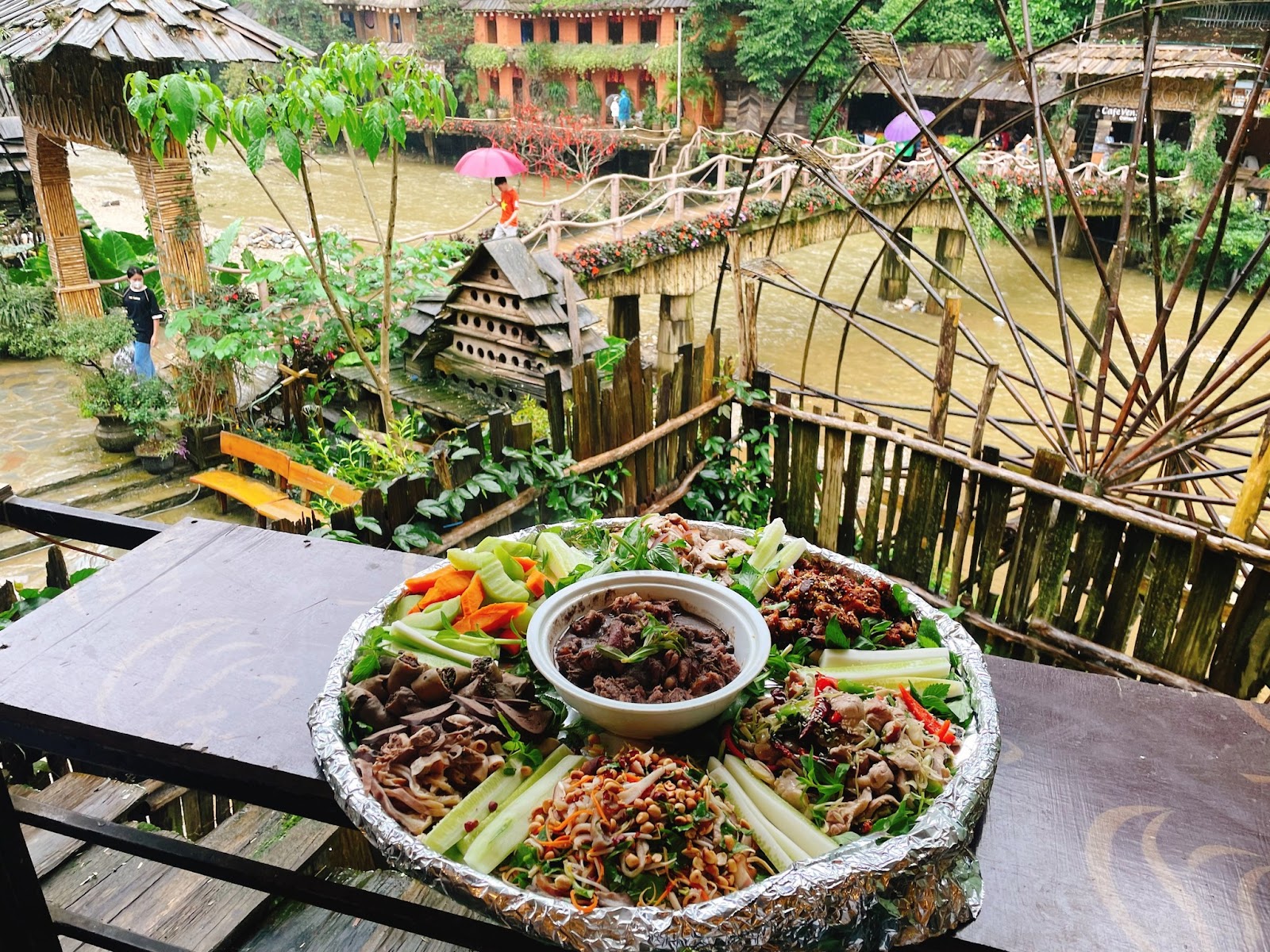 Hearty lunch by the stream in Cat Cat village.