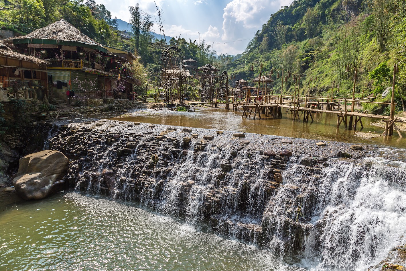 Poetic waterfall inside Cat Cat village.