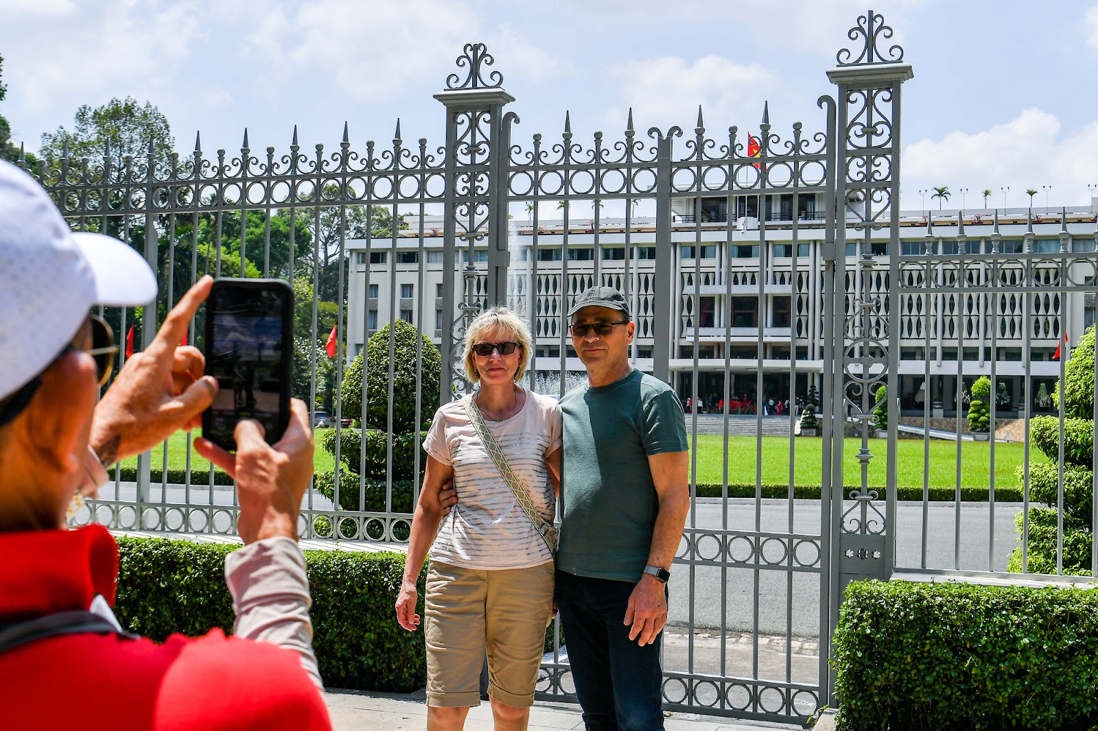 The gate of the Independence Palace, struck by Tank 390 in 1975, remains a major attraction for foreign tourists.