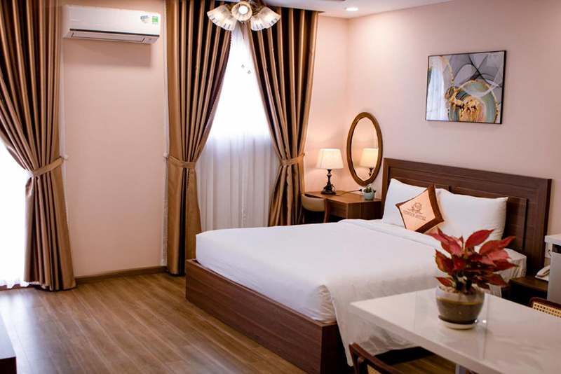 Không gian ngủ của Vidhous Hotel